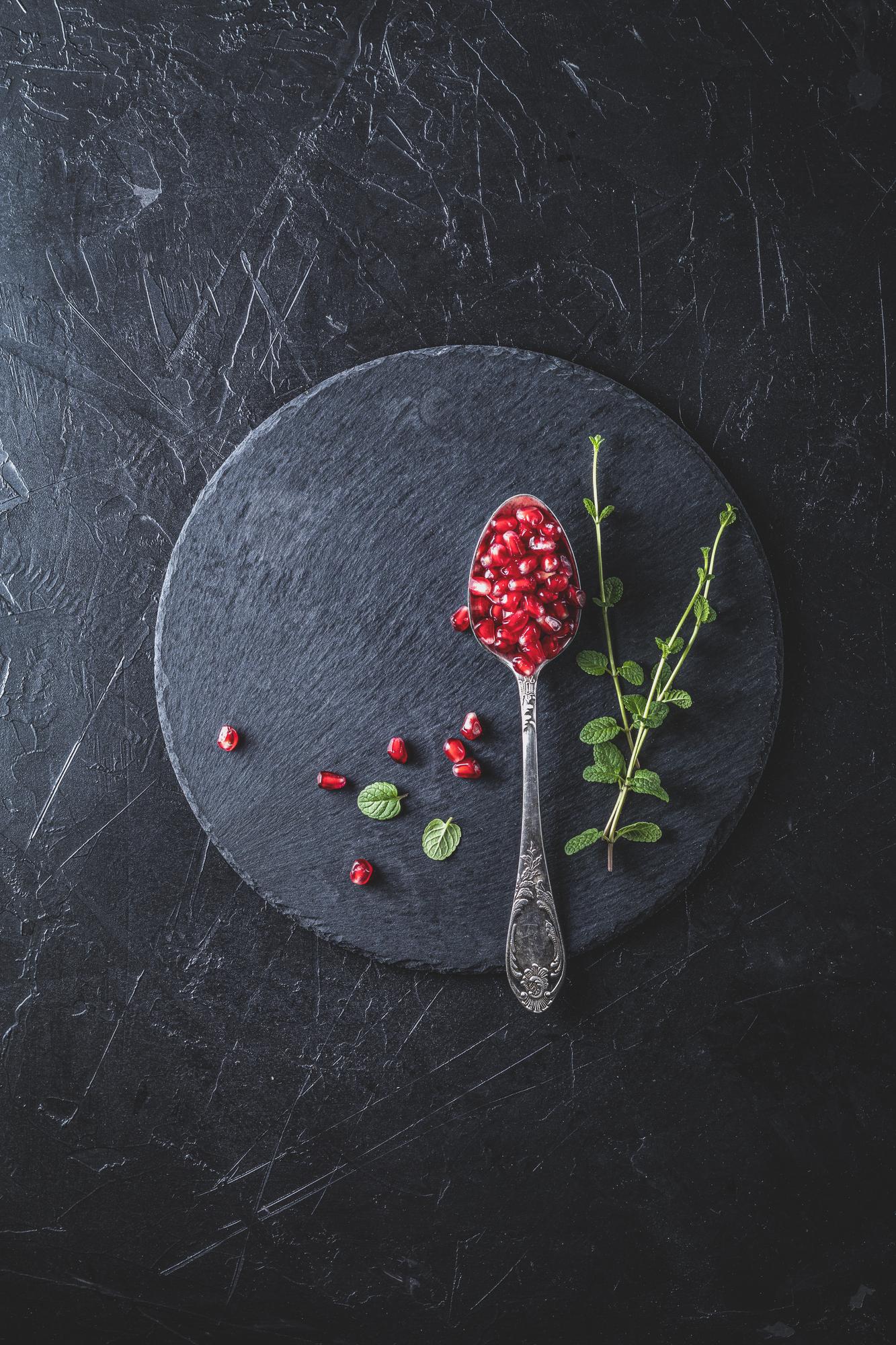Plated seasonal tasting menu on black stone
